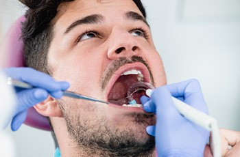 A checkup and cleaning is an important way to protect your oral health near Downers Grove