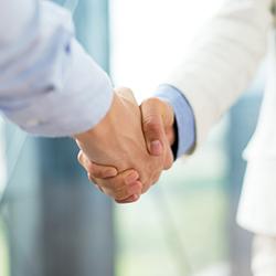 Two people shaking hands