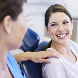 Woman receiving dental exam