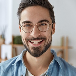 young man with dental implants in Lisle