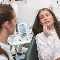 woman at dental checkup for cost of emergency dentistry in Lisle