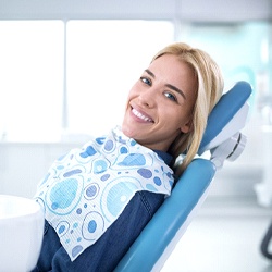 Woman visiting her dentist in Lisle for a restoration.