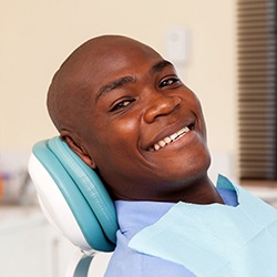 Smiling man in dental chair