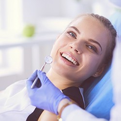 Female dental patient having a checkup performed