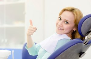 Woman happy because she chose the dentist lisle residents love.