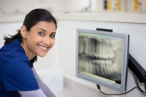 woman viewing dental x-ray