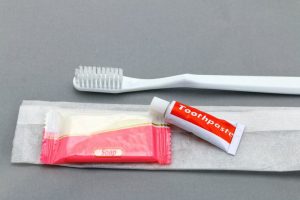 travel sized toothpaste and toothbrush