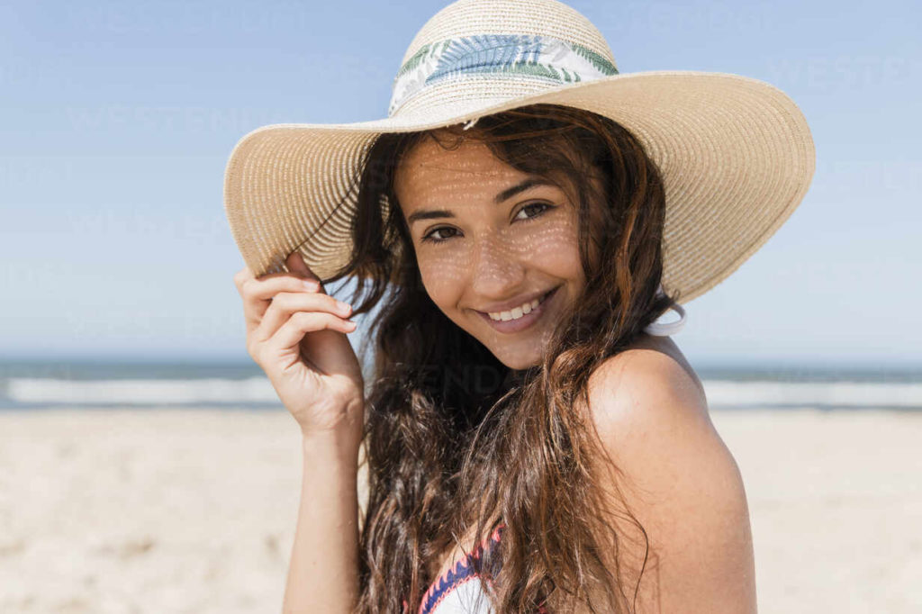 person with nice smile on beach