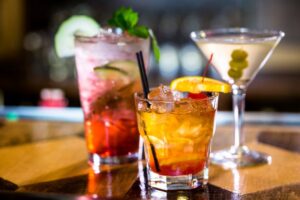 Three alcoholic drinks on a table