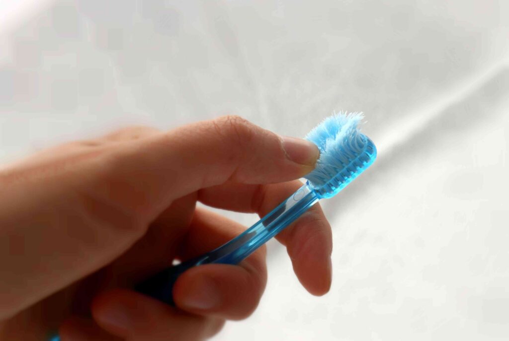 A frayed toothbrush