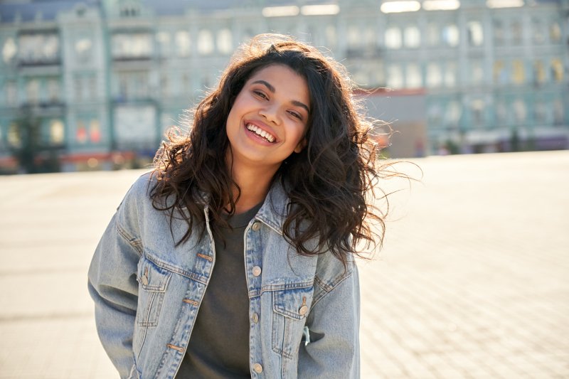 Lady smiles in parking lot